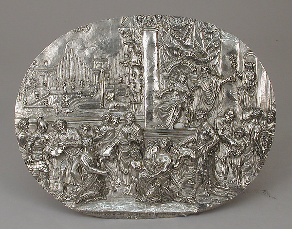 A silver relief depicting Cyrus and the release of the Jews.