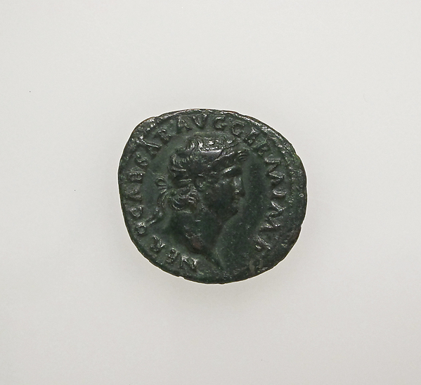 A bronze Roman coin bearing a portrait of Nero.